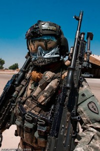 This isn't the guy I'm talking about, but is Crew Chief Sgt. Fred Oser, A. Company 2-25, Combat Aviation Brigade, with two 240bravos. (Gregory Giesky photo, click to see it bigger.)